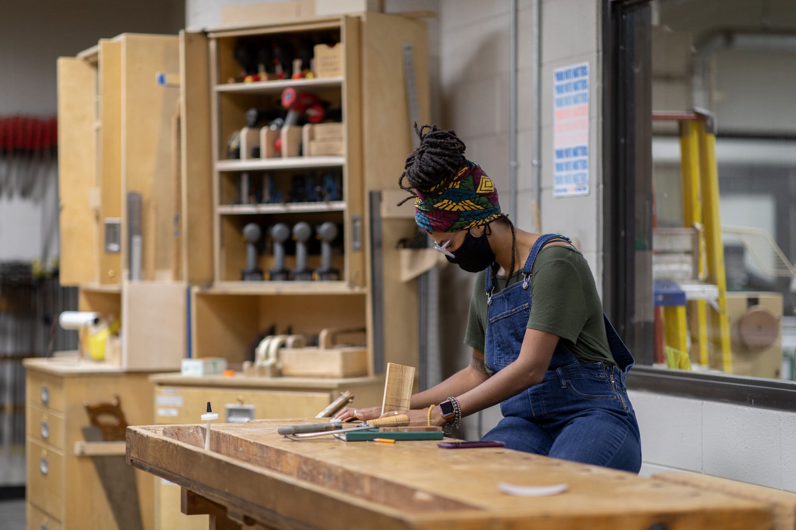 Photo of a student working in the woodshop