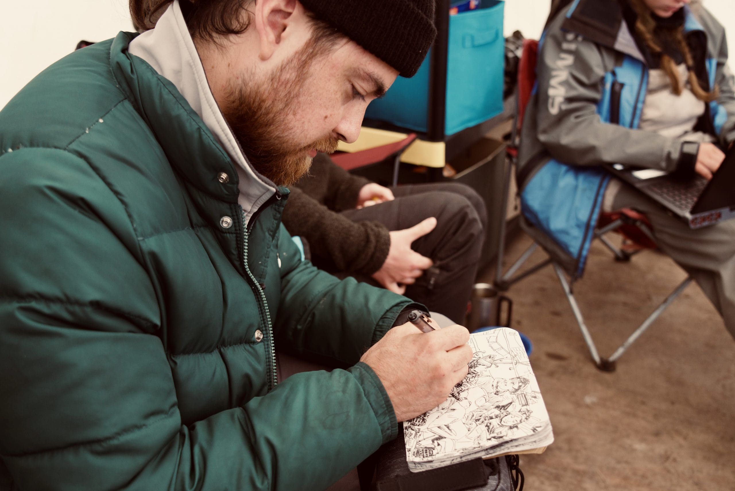 Francis Vallejo sketching in Alaska.