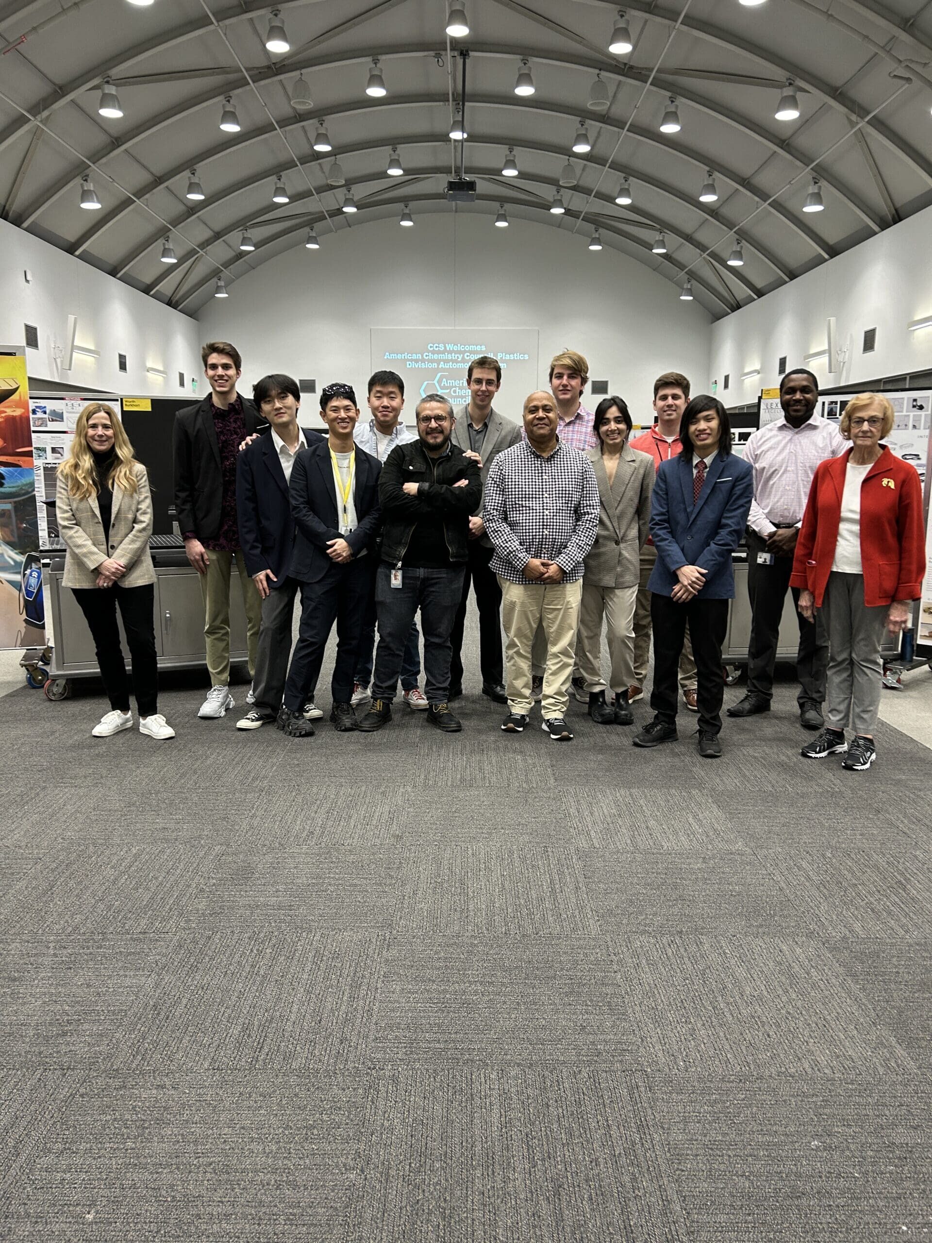 A large group of students are standing in The Knight Gallery.