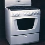 a white stove with a six burner cooktop